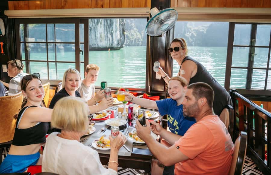 Halong Bay: Day Cruise with Caves, Kayaking & Sunset Party - Lunch on the Water and the Sunset Party Finale
