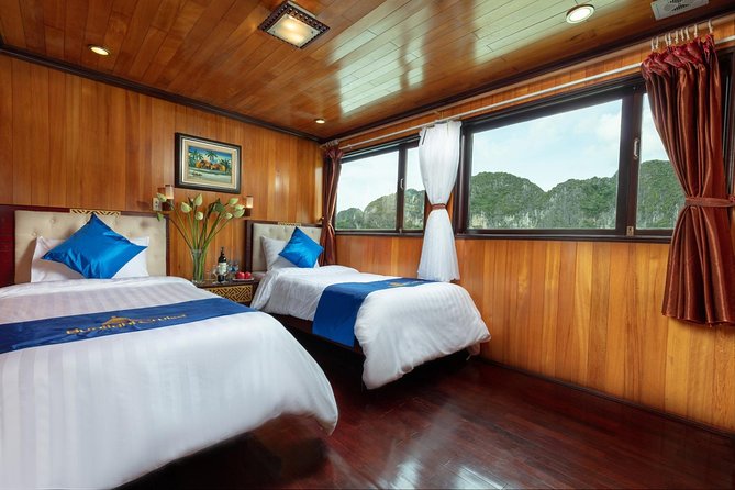 Halong bay deluxe cruise 2 days/ 1 night: kayaking, titop island, surprise cave - Your cabin on a traditional junk: comfort, AC, and what to expect