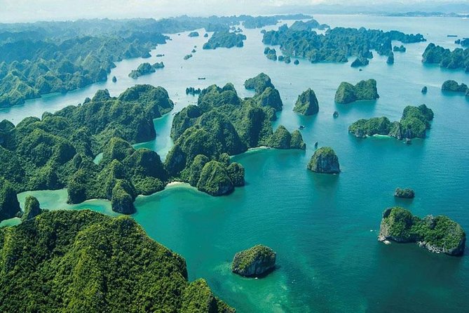 Halong Bay Full Day Tour with All-Inclusive: Boat, Kayak, Island, Cave and Lunch - Surprising Cave + tunnel cave time: seeing more than one “wow” pocket