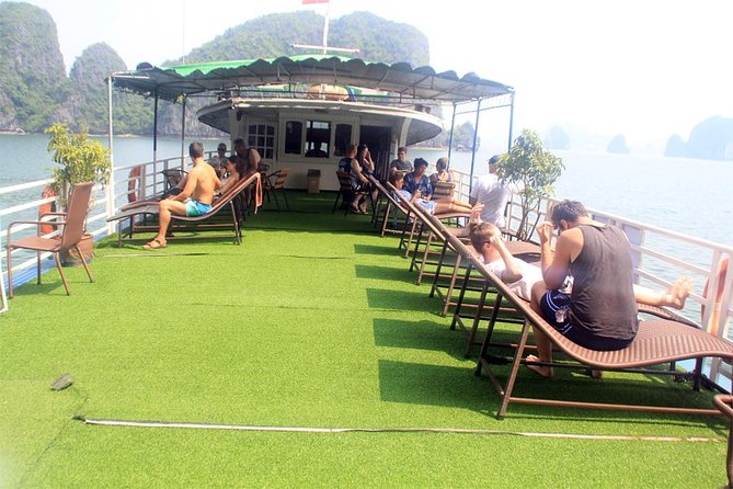 Halong bay full day trip: Visit Surprise cave, Titop island, kayaking & swimming - The cruise itself: panoramic windows and an included Vietnamese lunch