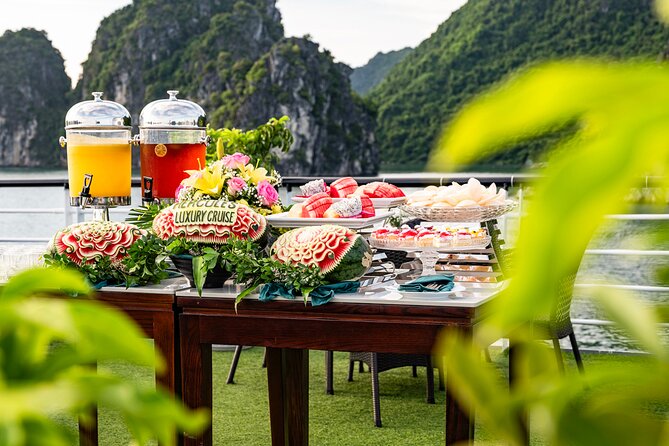 Halong Bay Luxury cruise Day trip: Buffet Lunch, Limousine bus - Titop Island: beach time plus the option for a viewpoint hike