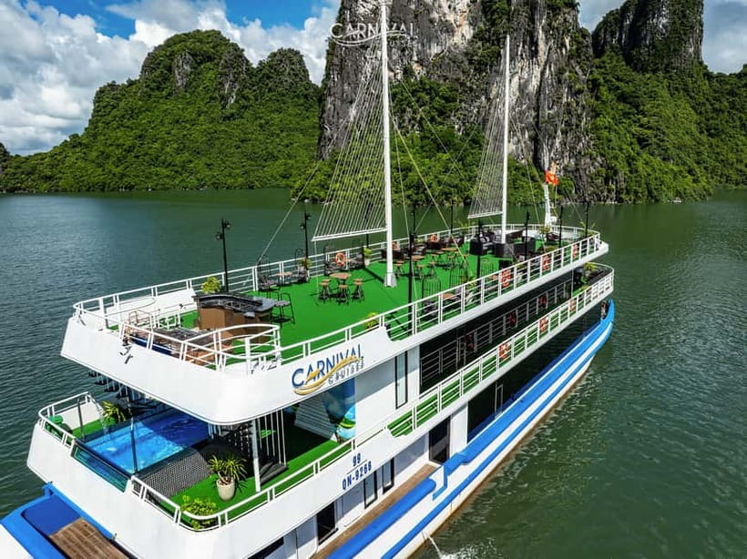 Halong Bay: Luxury Day Cruise, Caves, Kayak & Buffet Lunch - Titop Island: Swim Time or Viewpoint Climb