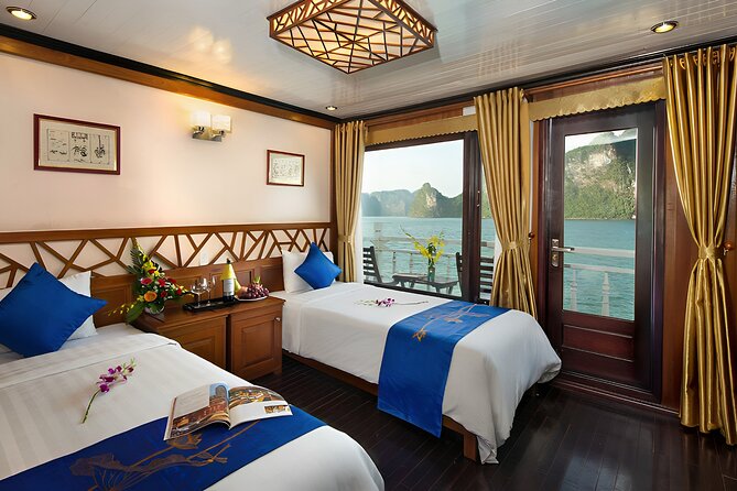 Halong Royal Palace Cruise 2 days - Day 1: Check-In at Tuan Chau, Bay Lunch, Titop Island Swim, and Luon Cave Kayaking