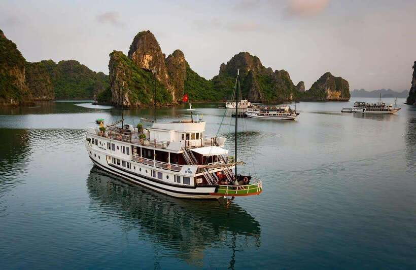 Hanoi: 2-Day Halong Bay Boutique Cruise with Kayaking - Day 1: Lunch cruise, cave visits, kayaking, and Titop-style island time