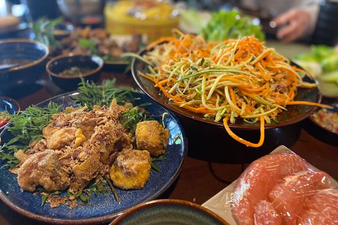 Hanoi: 7 Tasting Street Food Walking Tour and Train Street - Hanoi on Foot: How the Guide Turns Chaos into Tastes
