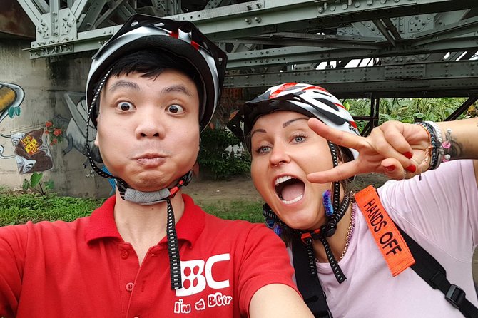 Hanoi: Amazing Morning with Bicycle - All Inclusive - Long Bien Bridge: pedaling a Hanoi icon above the Red River