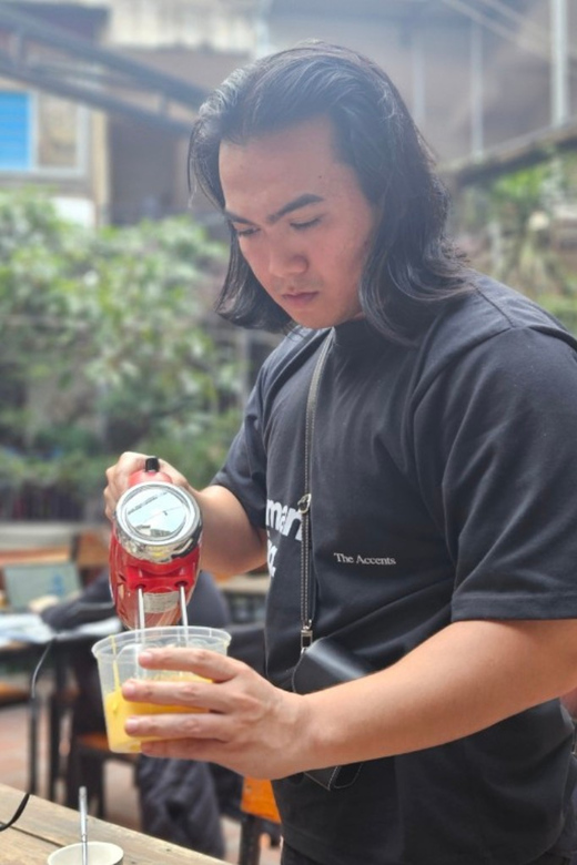 Hanoi Artisan Coffee Making Class with Train Street - The cafe setting: natural green where you’d least expect it