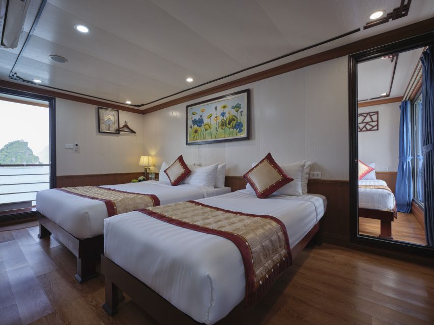 Hanoi: Aspira 5★ Overnight Cruise w/ Balcony & Free Transfer - The water break: swimming and time near the ship