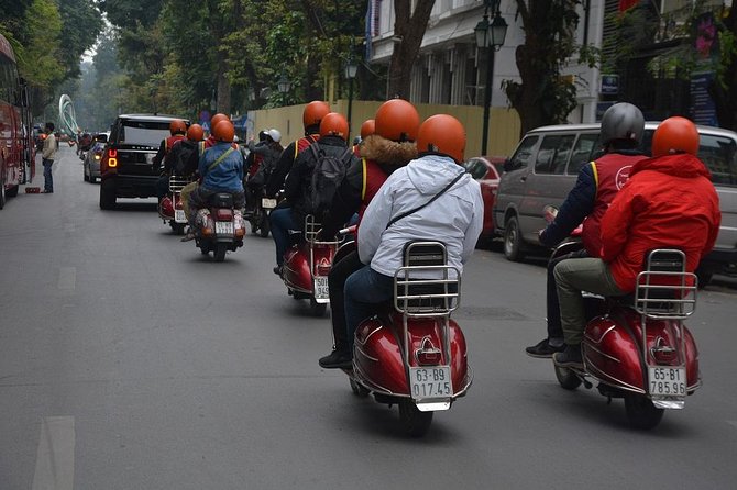 Hanoi Back Streets Vespa Tours: Hanoi Insider Vintage Vespa Tour - Huu Tiep Lake and the Downed B-52: history you can feel