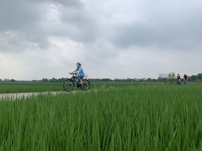 Hanoi: Bike Tour Through Hidden Gems and Banana Island - Ho Chi Minh Mausoleum Area: Big Symbol, Careful Details