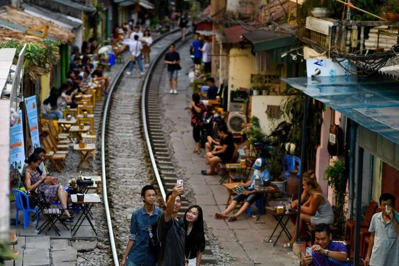 Hanoi: City Highlights Tour with Train Street & Hidden Gems - Hotel Pickup and the Van Plan for Hanoi Traffic