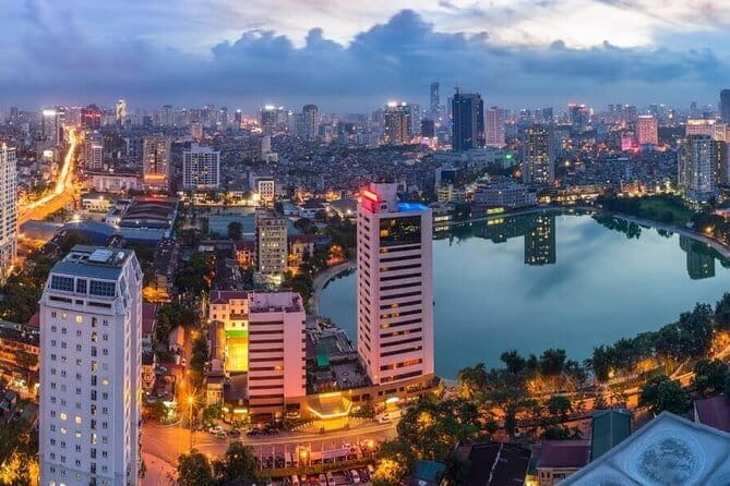 Hanoi Cyclo and Street Food Tour - Hanoi Opera House and Metropole Hotel exteriors: western-meets-Hanoi framing