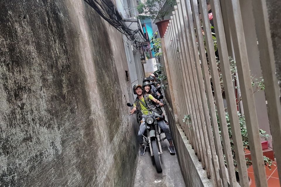 Hanoi Food, Culture, Sightseeing & Fun By Vintage Motorbike - Long Bien Bridge and Lake Views: Seeing Hanoi’s Scale