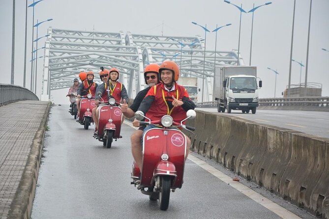 Hanoi Food Tours: Hanoi Foodie Scooter Tour Led By Women - Train Street coffee and the Ho Chi Minh Memorial at night