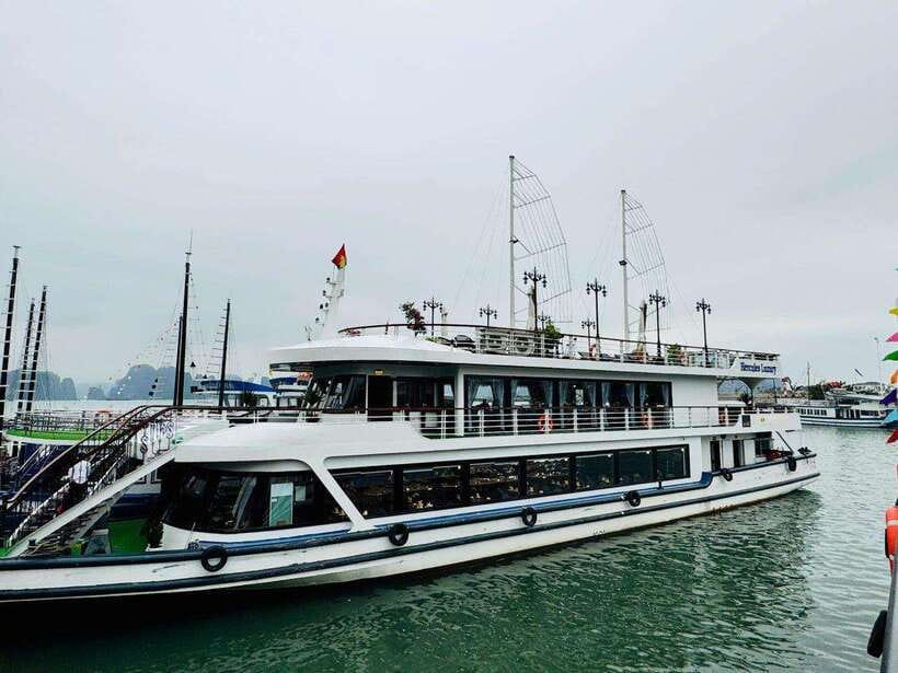 Hanoi: Ha Long Bay Day Trip - Luxury Cruise & Buffet Lunch - Sunset party on the bay: juice, tea, cakes, and fruit