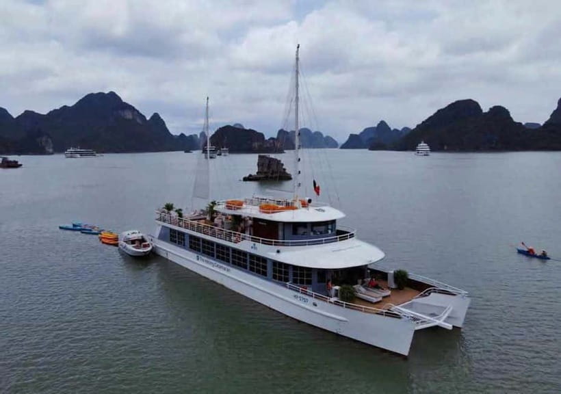 Hanoi/Ha Long: Ha Long Bay Luxury Day Cruise by Catamaran - Luon Cave Area: Kayaking or Bamboo Boat Ride Through the Limestone Canyons
