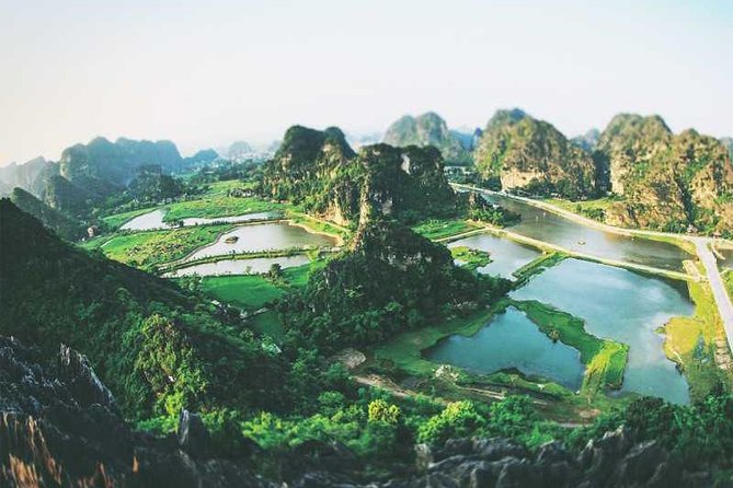 Hanoi - Hoa Lu - Tam Coc - Mua Cave - 1 Day Tour. By Luxury Limousine From Hanoi - Tam Coc boat trip and bicycle loop: the best way to see the caves