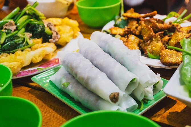 Hanoi Jeep By Night Street Food Tour and Train Street Experience - Stop 2: Bun cha and nem on the family-cooking streets