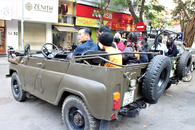 Hanoi Jeep Tours Led By Women: City & Red River Half Day - Passing Ba Dinh Square and major landmarks without feeling rushed