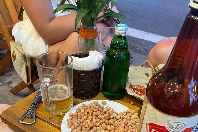 Hanoi Local Fresh Beer and Culinary Tour with Train Street Visit - Stop 1 and Stop 2 flavor logic: roasted peanuts lạc with fresh beer