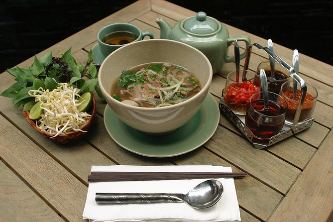 Hanoi Market & Villa Cooking Class: Free Old Quarter Transfer - Cooking four Hanoi classics in a small villa kitchen