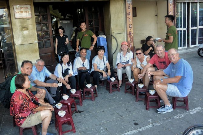 Hanoi Michelin Star Walking Food Tour & Train Street - Meeting at Hidden Gem Cafe and Getting Ready to Cook