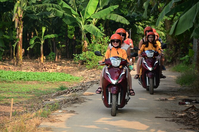Hanoi Motorbike Led By Women: Hanoi Countryside Motorbike Tours - Long Bien Bridge to an 800-year-old village: bonsai, candy, and tea in a 200-year-old home