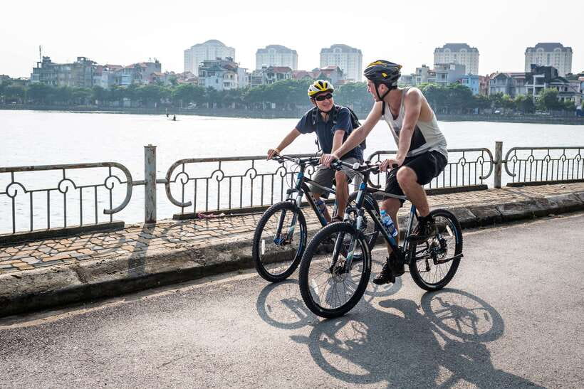 Hanoi: Private Countryside Bike Tour with Hotel Transfer - West Lake district: lakeside calm with a real city backdrop