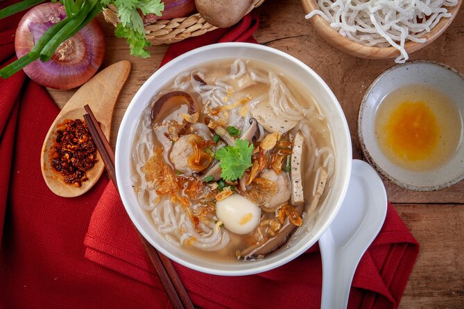 Hanoi Street Eats Evening Small Group Tour - Hanoi Old Quarter at 6 pm: street food in motion