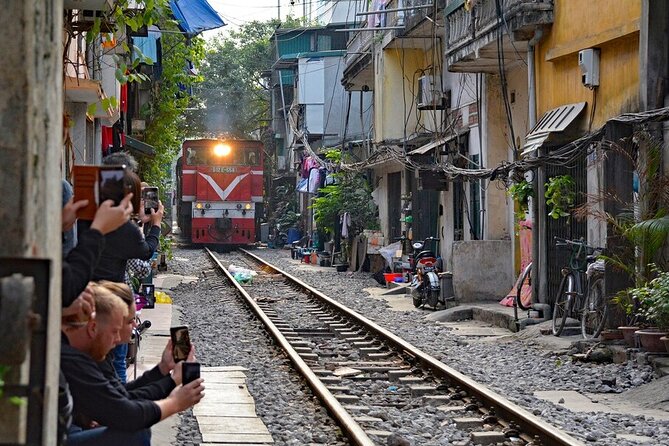 Hanoi Street Food Adventure: Train Street & Local Delights - Train Street in 30 minutes: watching trains pass while you sip