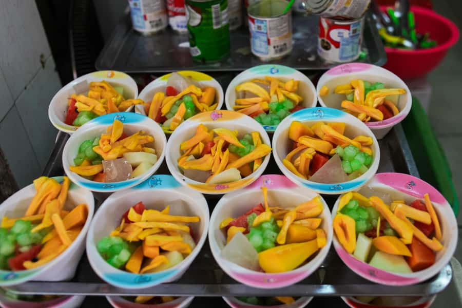 Hanoi: Street Food Walking Tour & Water Puppet Show - Hoàn Kiếm lake at night and your Hanoi orientation boost