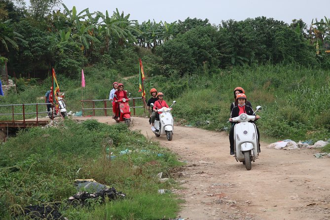 Hanoi Vespa Countryside Tour With Female Ao Dai Riders Half Day - Female Ao Dai riders and the comfort factor in Hanoi traffic