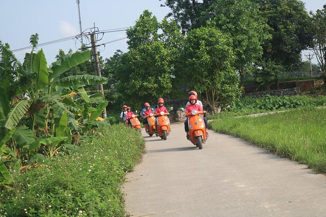 Hanoi Vespa Full Day City & Countryside with Female Ao Dai Riders - Ba Dinh Square area and An Duong market: where lunch becomes a culture lesson