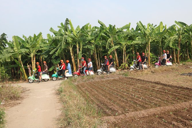 Hanoi Vespa Tour Explore Red River Delta & Rural Villages 5 Hours - Long Bien Bridge stop: one of Hanoi’s older icons
