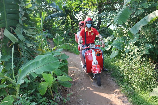 Hanoi Vespa Tour Explore Red River Delta & Rural Villages 5 Hours - Weather and comfort: rain ponchos are not a small detail