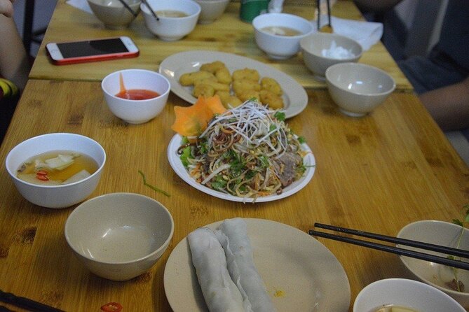 Hanoi Vespa Tours: Hanoi Vintage Vespa Food Tours - French Quarter lights and the Red River photo moment