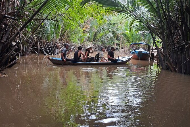 HCM: 2-Day Mekong Delta Floating Market with Cooking & Bike Ride - Coconut candy, fruit gardens, honey tea, and a python photo stop