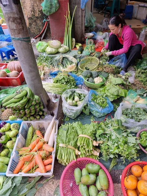 HCMc:Vietnamese Cooking Class with Local market tour & Meal - Hands-on cooking: prepping ingredients and cooking the Vietnamese way