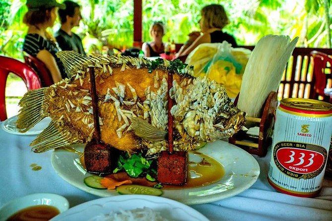 HCM:Mekong Delta Boat,Khotcake cooking Coconut Village,SmallGroup - Honey tea, coconut candy, and the Khot cake cooking moment
