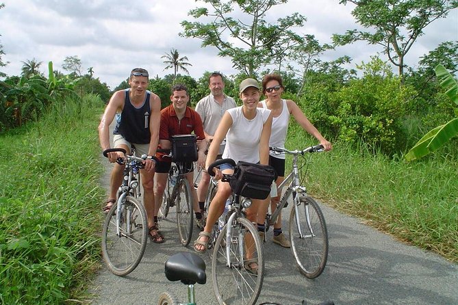 HCM:Mekong Delta Boat,Khotcake cooking Coconut Village,SmallGroup - Vinh Trang Pagoda: a solid cultural anchor in the middle of the day