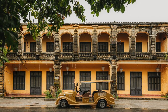 Heritage Adventure Private Tour by Electric Car - Getting oriented fast: Central Market and the Thu Bon River crossing
