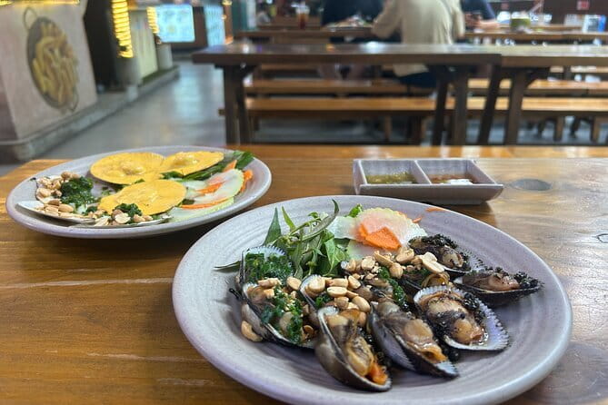 Ho Chi Minh City Food Tour with 8+ Authentic Local Tastings - Nguyễn Huệ pedestrian walk: where the pace picks up and the secret dish happens