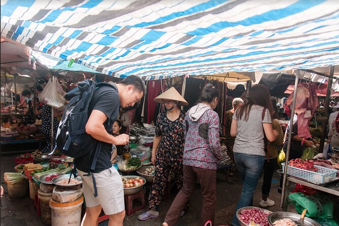 Ho Chi Minh City Motorbike Tour w Student + Safe + Fun - Stop-by-stop: Thich Quang Duc Monument and Ho Thi Ky Flower Market