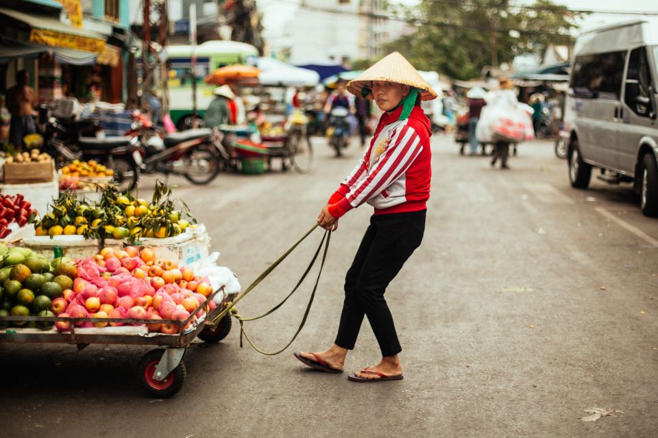 Ho Chi Minh City: Private City Tour Off the Beaten Track - Binh Tay market: fruit tasting and everyday momentum