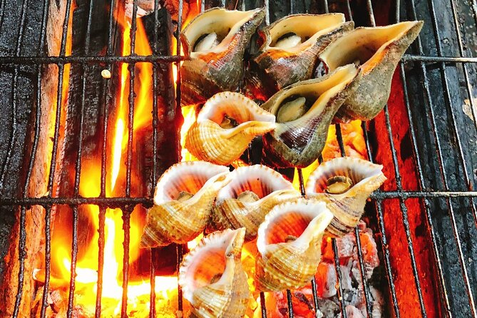 Ho Chi Minh Nightlife & Street Food Tour By Motorbike - Stop 3: Phố Tau Sai Gon (Chợ Lớn Quận 5)—street-life scenes and photo-friendly chaos
