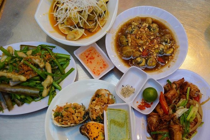Ho Chi Minh Nightlife & Street Food Tour By Motorbike - The street-food dinner: BBQ, seafood, bánh xèo, and dessert (with mineral water included)