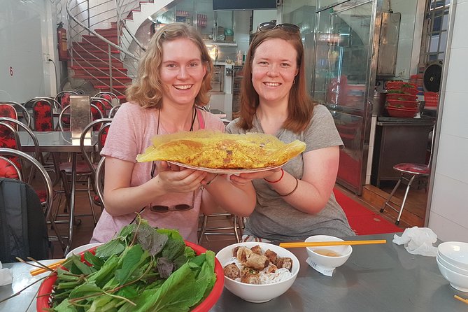 Ho Chi Minh Private Half Day Street Food Tour with Local Students - Stop experience one: starting with beef noodle soup and classic street flavors
