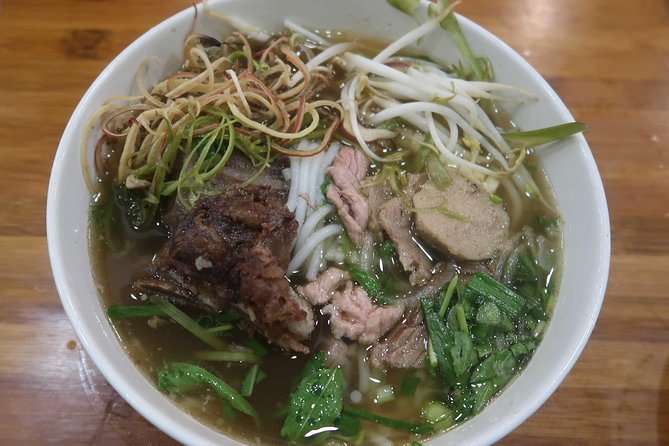 Ho Chi Minh Private Half Day Street Food Tour with Local Students - BBQ pork with rice noodles, then bánh mì: ending with two winners