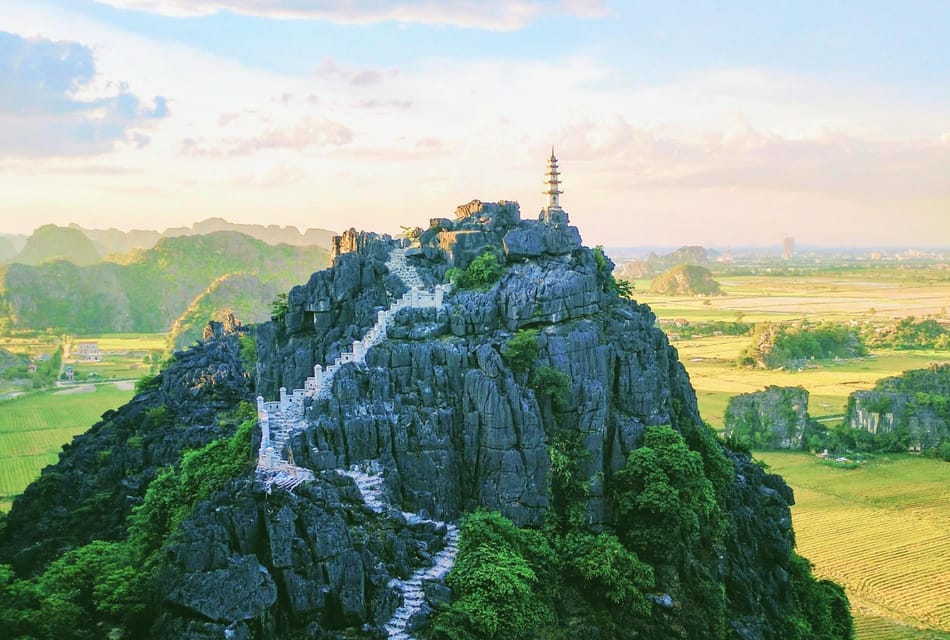 Hoa Lu, Tam Coc, & Mua Cave Day Trip with Lunch & Limousine - Tam Coc cruise on the Ngo Dong River, plus the caves