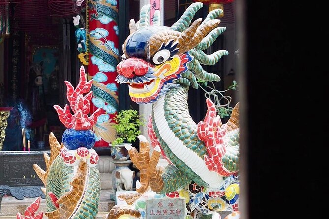 Hoi An Ancient Town Walking Tour with a Local - Stop 2: Japanese Covered Bridge for architecture and symbolism